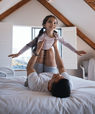 Buy stock photo Airplane, fun and happy girl with father on a bed playing, bonding and enjoying the morning indoors. Flying, game and child with parent in a bedroom for creative, fantasy and childhood happiness 