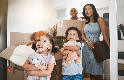 Buy stock photo Moving, happy and real estate with family in new house for investment, property and future. Smile, boxes and purchase with children and parents for mortgage, excited and homeowner relocation