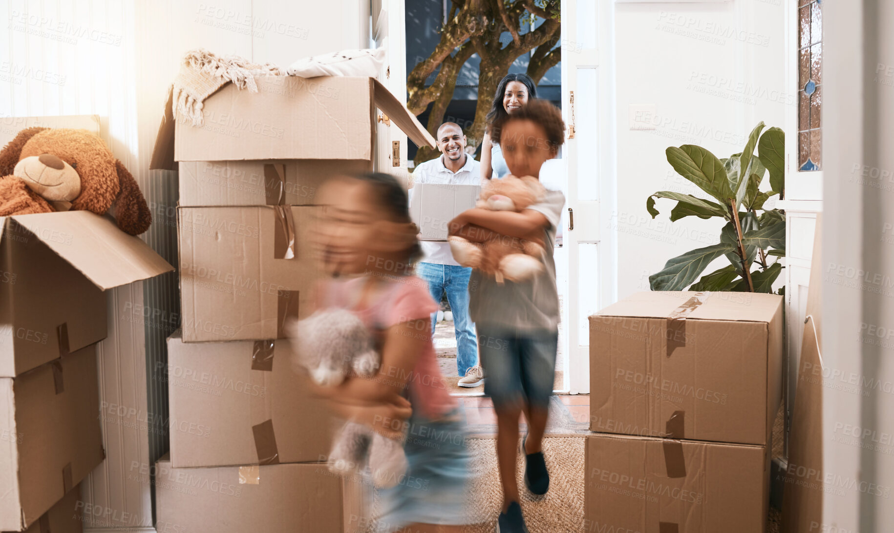 Buy stock photo Moving, running and happy with family at new house for real estate, property and mortgage. Future, investment and homeowner with excited children and parents at front door for rent, purchase or sale