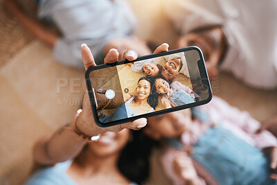 Buy stock photo Happy, relax and selfie of family on floor of living room for social media, communication and internet from above. Website, funny and picture with parents and children at home for love and bonding