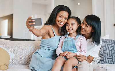 Buy stock photo Selfie, grandmother and kid with mother in home living room, bonding or having fun. Family, happiness and girl with grandma and mama, care and enjoying time together while taking pictures on sofa.