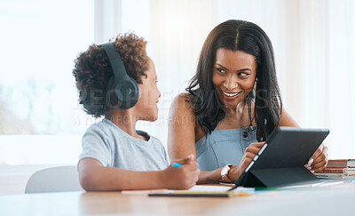Buy stock photo Elearning, happy and a mother and child with a tablet for education, studying and online class. Smile, teaching and a mom helping a boy kid with homework with technology during homeschooling