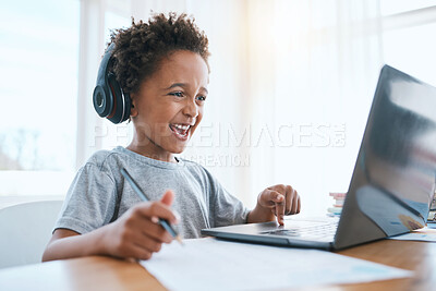 Buy stock photo Learning, laptop and headphones of child for online education, language translation and writing in virtual class. Happy african kid on audio tech, computer and web, streaming and development at home