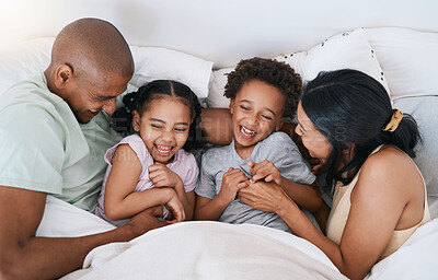 Buy stock photo Happy family, relax and playing in bed above with smile in free time, weekend or fun holiday morning at home. Mother, father and children relaxing and laughing together for playful joy in the bedroom