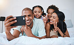 Selfie smile, family and peace sign in bedroom, bonding and relaxing together in home. Bed, photo and children with mother and father taking pictures for happy memory, social media or v hand emoji.