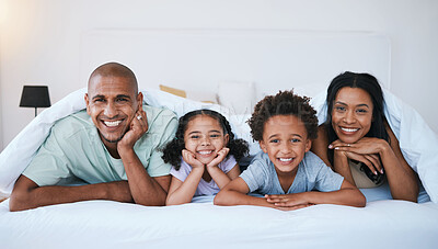 Buy stock photo Portrait, family and smile in bedroom blanket in home, bonding and relaxing or lying. Bed, happiness and children with mother and father enjoying quality time together, having fun and care in house.