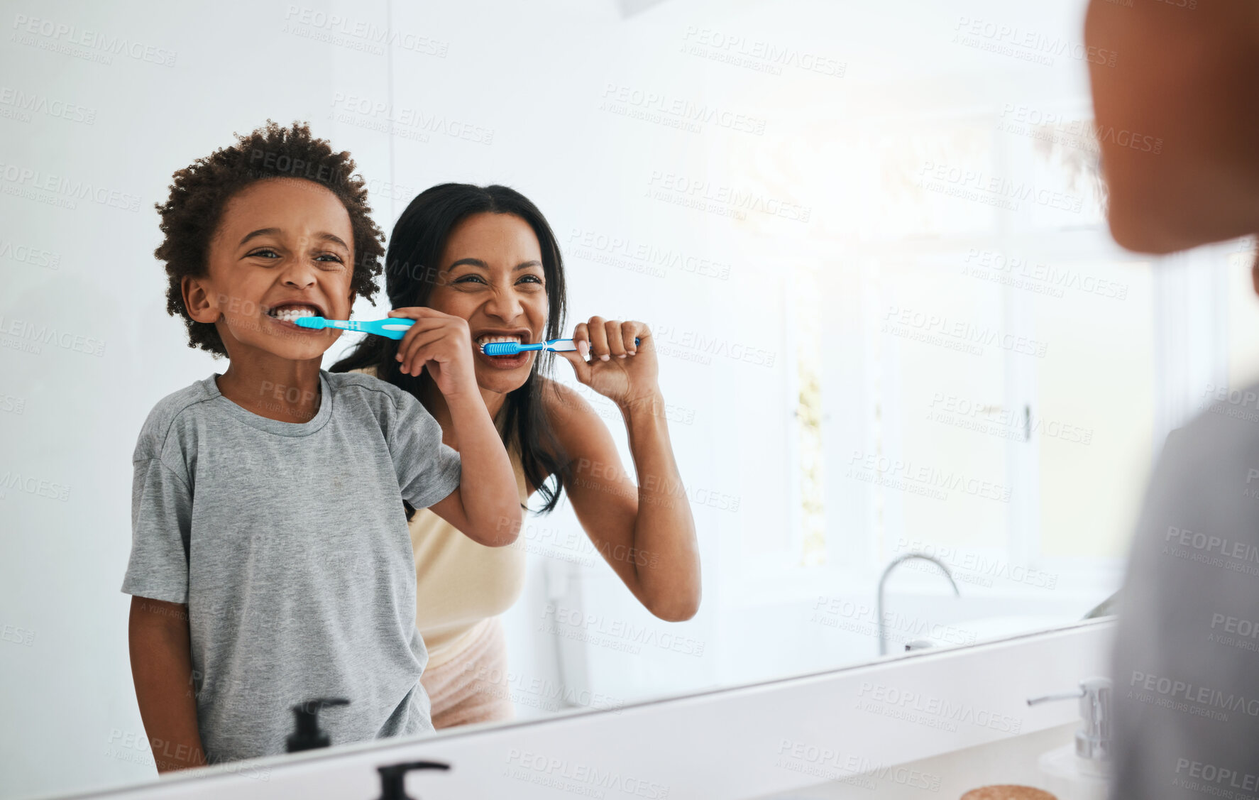 Buy stock photo Learning, mother and son brushing teeth, dental hygiene and wellness at home, bathroom and bonding. Family, female parent or mama with male child, kid or boy with oral health, cleaning mouth or smile