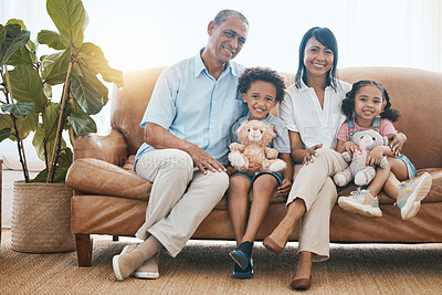 Buy stock photo Grandparents, portrait and kids smile in home living room on sofa, bonding or having fun. Family, happiness and children with grandma and grandpa, care and enjoying time together with teddy bear.