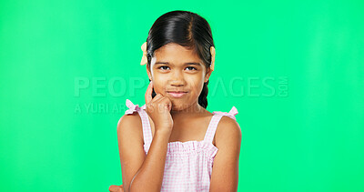 Thinking, green screen and idea by child with a question feeling excited, thoughtful and isolated in studio background. Planning, girl and joyful kid is happy, curious and planning expression