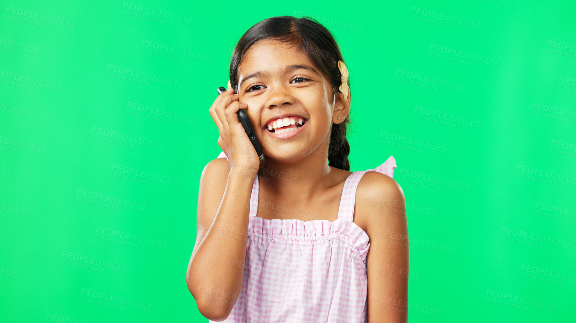 Buy stock photo Child, smartphone or communication on green screen or smile against studio background, happiness or face. Portrait, phone call or talking for conversation, voice or technology for 5g, network or chat