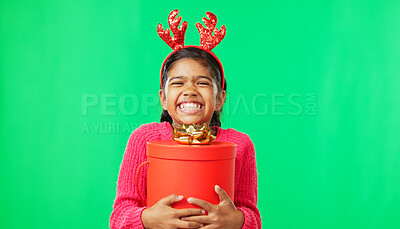 Buy stock photo Christmas, gift box and portrait with girl in green screen studio for celebration, cheerful and festive. Present, joyful and vacation with face of child on background for season, holiday or happiness