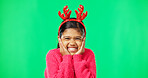 Face, Christmas horns and girl excited, green screen and happiness against a studio background. Portrait, young person and female child with smile, Xmas and surprise with excitement, joy and cheerful