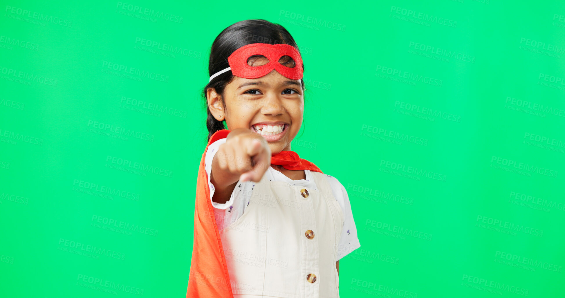 Buy stock photo Portrait, smile and a girl superhero pointing at you on a green screen background to vote for her choice. Kids, creative and fantasy with a happy young child on chromakey for a decision or selection