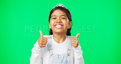 Portrait, children and thumbs up with a girl on a green screen background in studio wearing a princess tiara. Kids, thank you and emoji with an adorable little girl child saying yes in agreement