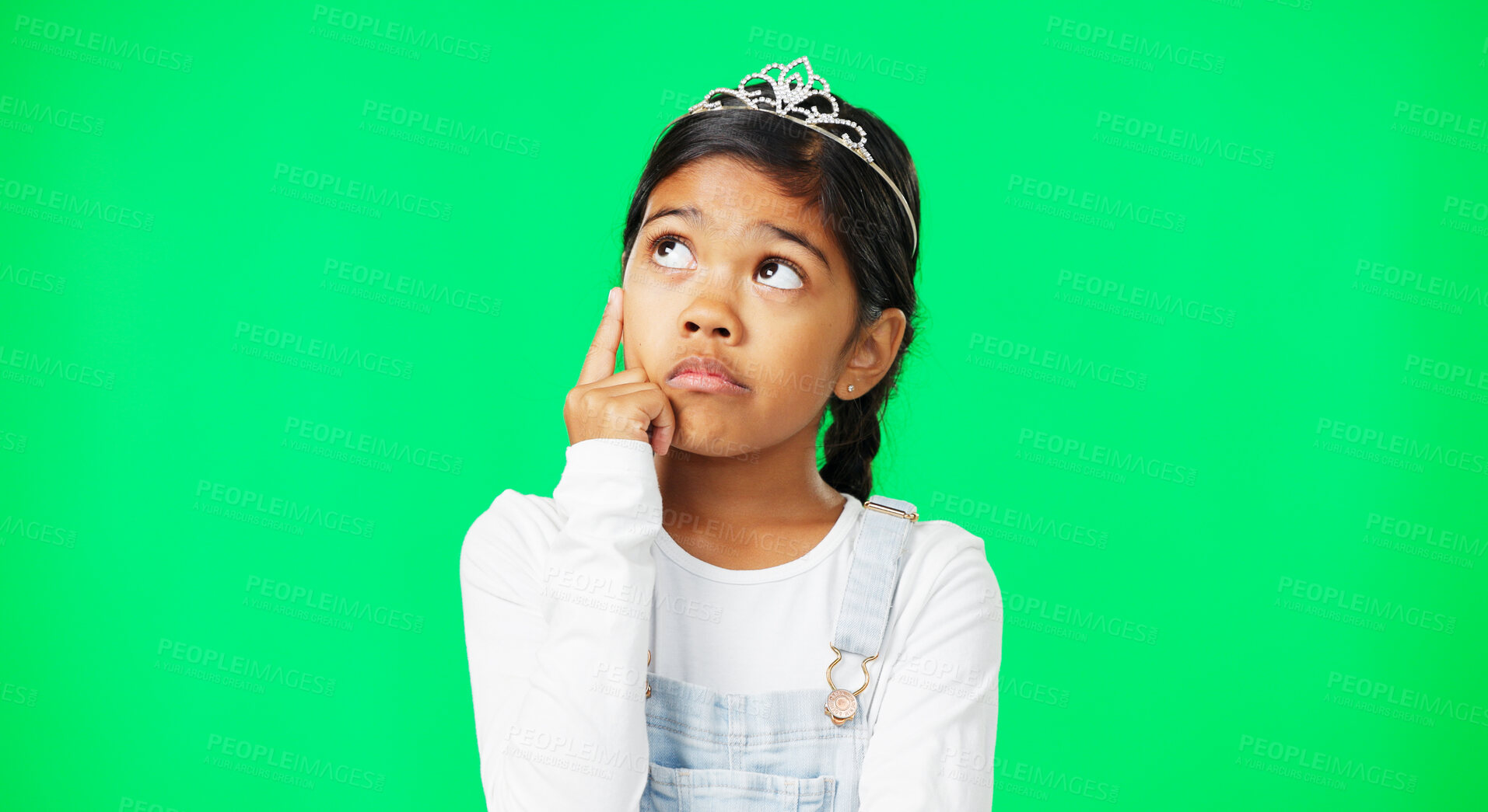 Buy stock photo Thinking, princess tiara and a girl on a green screen background for fantasy problem solving. Idea, question or mock up with a young child in a crown for royalty looking away for inspiration