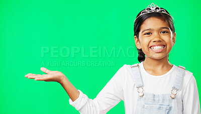Buy stock photo Kid, princess and smile with portrait in studio on green background for mockup. Girl, alone and excitement in happiness with crown for presentation, product placement or announcement on social media