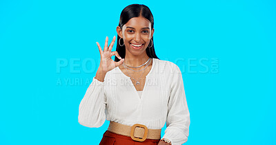 Buy stock photo OK hand sign, woman and agreement, review or feedback with portrait isolated on blue background. Emoji, gesture with support or success in studio, mockup space with like or yes for vote or opinion