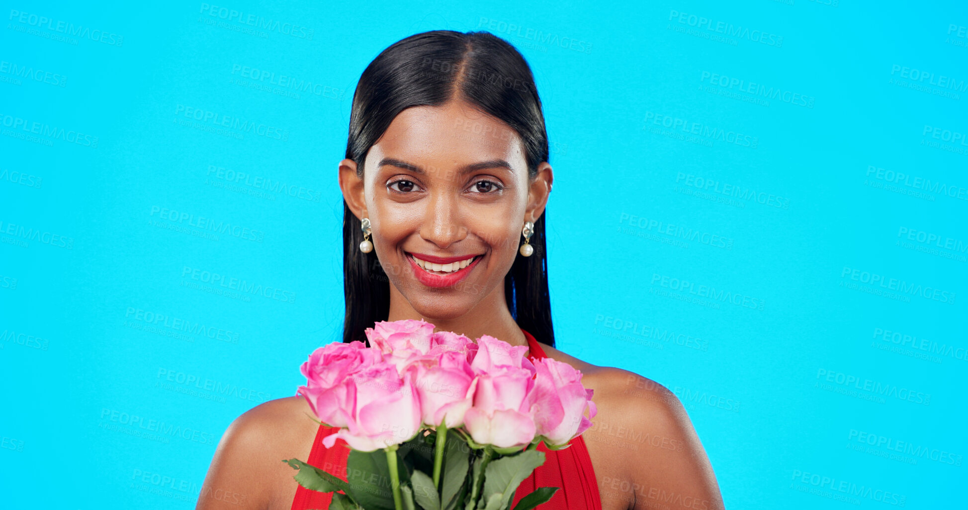 Buy stock photo Rose bouquet, date and relax woman portrait with gift, present and floral bunch for love and valentines day. Model, studio and female person with blue background and flowers with a smile and makeup