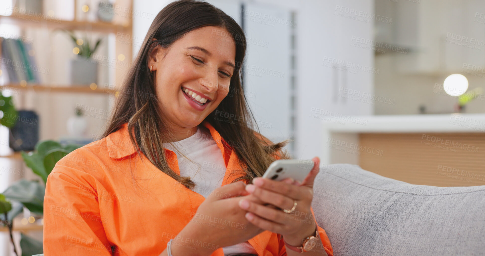 Buy stock photo Funny, phone and woman typing in home living room on sofa for social media, meme or comedy. Smartphone, laughing and happy person on couch reading email notification, online communication or internet