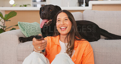 Woman laughing and watching tv with her dog in living room for comedy show, streaming movie or film relax, happy and joy. Funny person watch television with puppy pet, animal or Labrador retriever