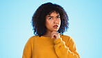 Confused, face and thinking by black woman in studio, pensive and wondering on blue background. Doubt, portrait and unsure girl with decision, choice or emoji on mockup, product placement or isolated