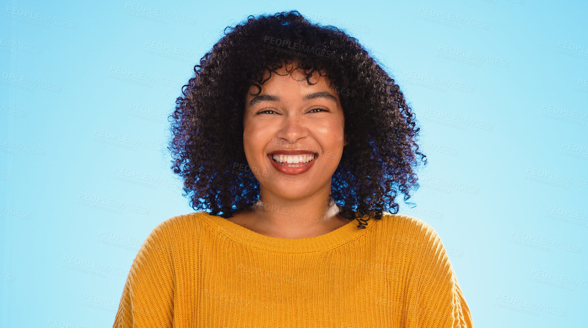 Buy stock photo Face, smile and woman in studio for fashion isolated on a blue background mockup space. Portrait, excited model and confidence of happy person in clothes for style, cool and trendy in South Africa
