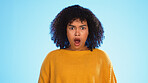 Surprised, face of black woman in studio, Shocked and wondering on blue background. Doubt, portrait and unsure girl with decision, choice or emoji on mockup, product placement or isolated