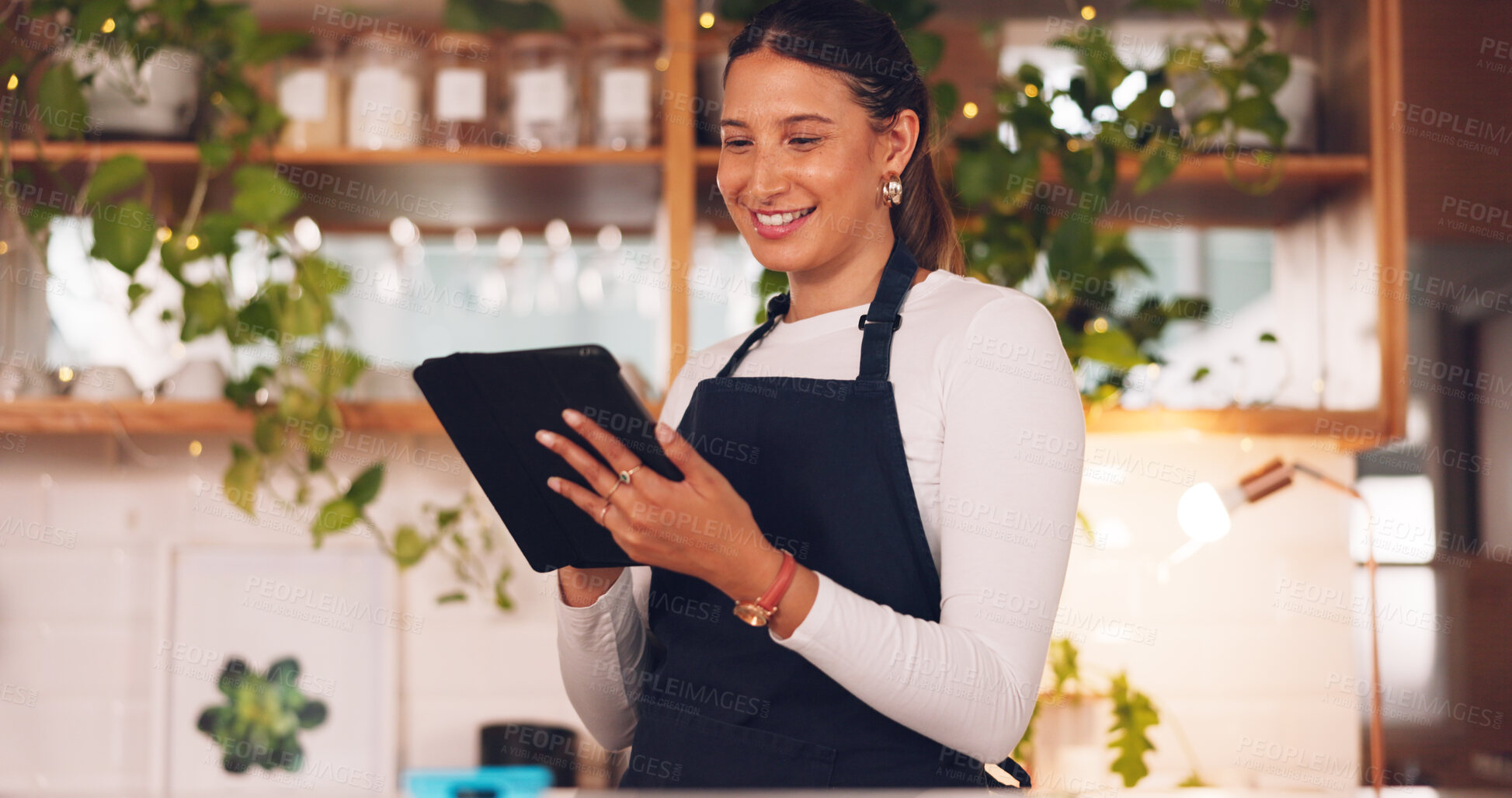 Buy stock photo cashier, woman and business owner on tablet for cafe management, online profit or planning in store. Entrepreneur, waitress or barista on digital technology, restaurant or coffee shop startup