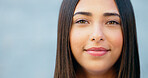 Closeup of smiling woman against grey wall background with copy space in city. Portrait, headshot or face of smiling, fun and trendy student.