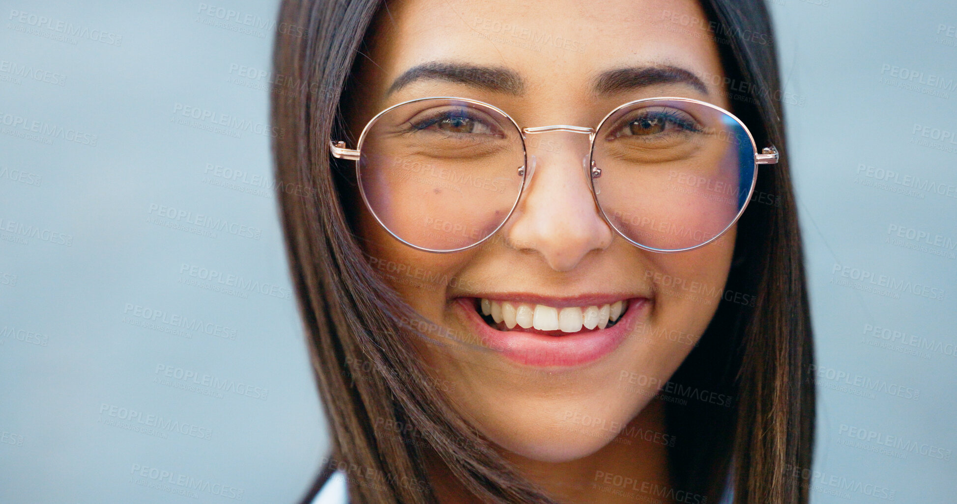 Buy stock photo Portrait, smile and woman in glasses in studio isolated on a blue background mockup space for fashion. Face, eyewear and happy model with spectacles for vision, optometry and optometrist in Brazil