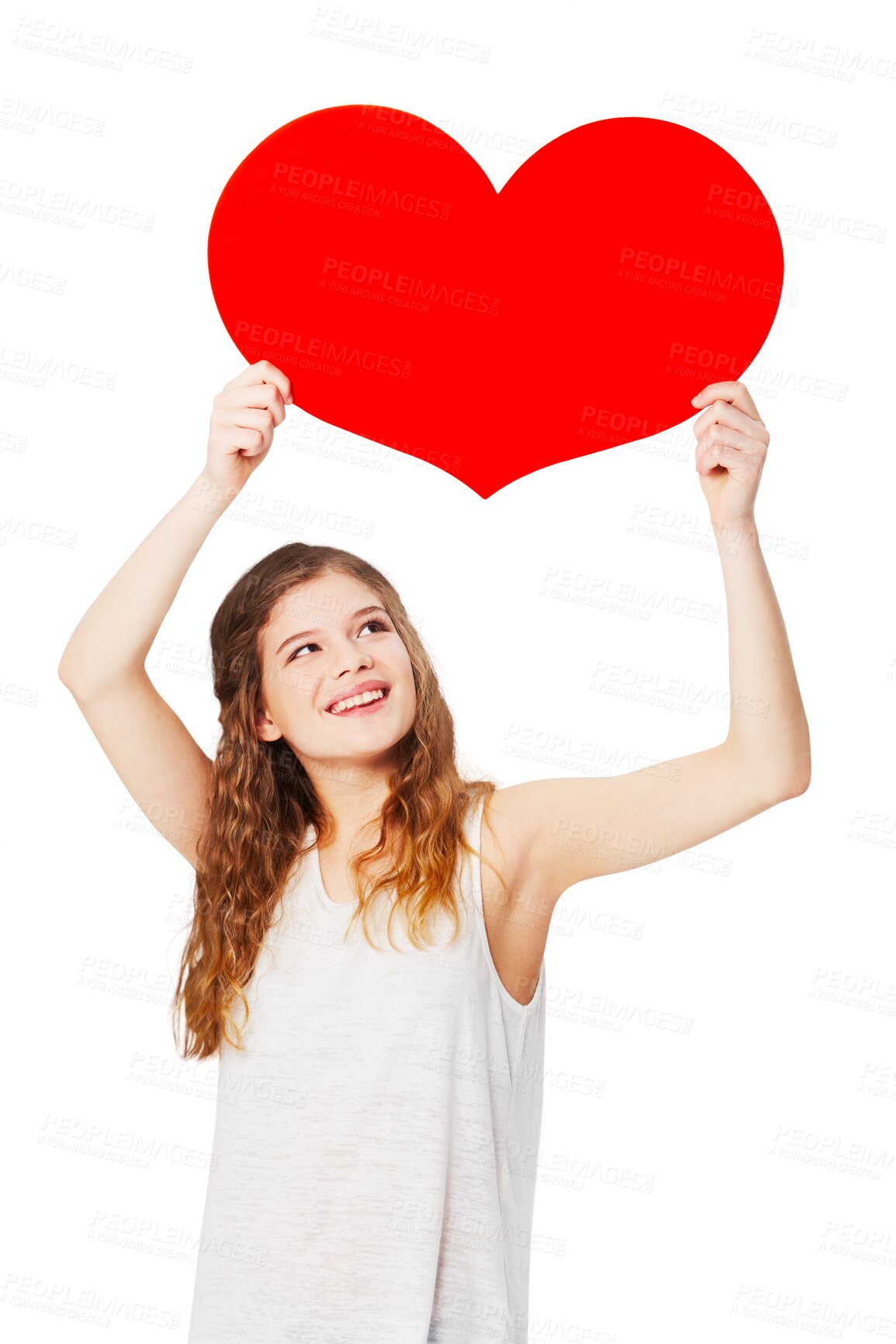 Buy stock photo Red heart, happy and teenager in a studio with a cardboard poster with mockup space for advertising. Happiness, smile and girl model holding a love emoji with mock up isolated by a png background.