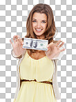 Studio shot of a beautiful young woman holding out a dollar bill isolated on a png background