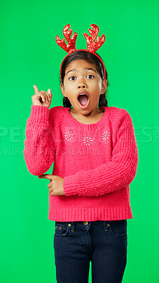 Buy stock photo Christmas, surprise and portrait of girl on green screen with ideas, announcement and news. Festive, headband and child in studio with shocked face for holiday, celebration and Santa list in studio