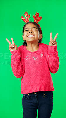 Buy stock photo Christmas peace sign, green screen and portrait of happy child excited for festive holiday, celebration or event. Happiness, emoji v icon and young girl, kid or youth smile on studio background