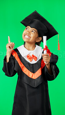 Buy stock photo Happy graduate, green screen and child pointing at learning success news, education information or school graduation promo. Kindergarten scroll, youth commercial and kid student on studio background