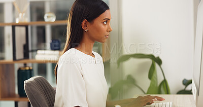 Business woman typing on keyboard computer for copywriting, email newsletter in public relations, digital marketing or project management. Corporate girl on PC working on social media website report