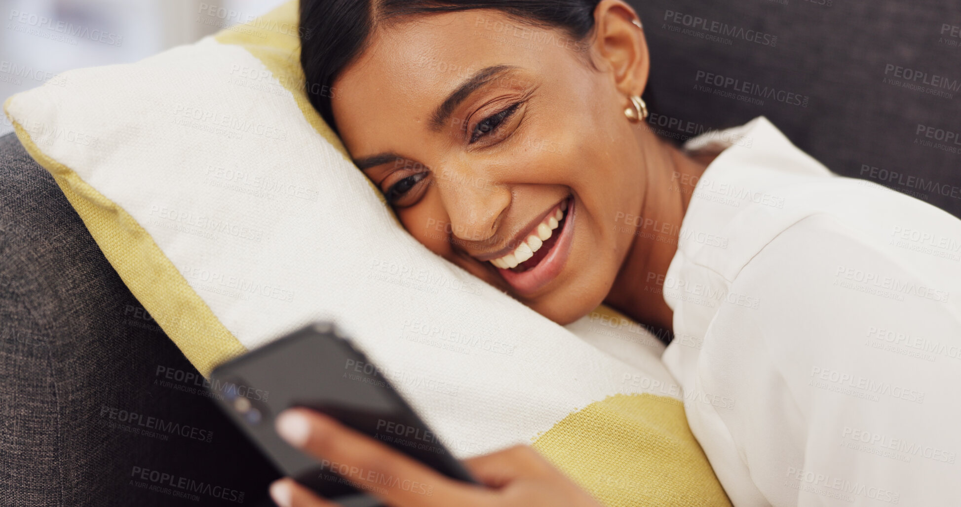 Buy stock photo Social media, smile and Indian woman on sofa with phone  for online website, internet and texting at home. Communication, connection and happy person relax in living room on smartphone for mobile app