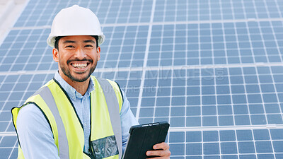 Solar, electricity and construction being done by an engineer while using a tablet for research or planning. Portrait of one young and cheerful architect smiling while browsing on technology