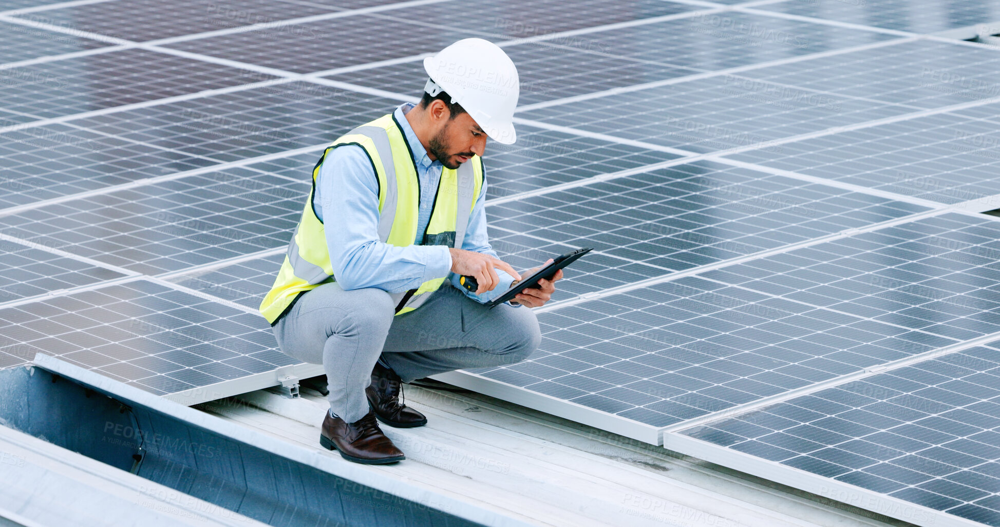 Buy stock photo Engineer, contractor tablet and solar panel with a man on roof with sustainability project. Engineering technician, green clean energy and eco friendly work with monitoring and maintenance from above