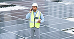 Ambitious, happy and confident solar power installer, engineer and electrician talking on a phone while discussing blueprint plans for construction, building and maintenance of renewable energy