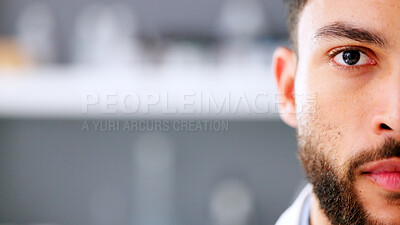 Face of serious young male in a high stress environment. Closeup of a business man head with a beard feeling anxious and stressed about work. Nervous office employee worried and looking forward.