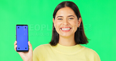 Buy stock photo Portrait, green screen and woman with a smartphone, showing and promotion on a studio background. Face, person and model with a cellphone, tracking markers and smile with mobile user and digital app