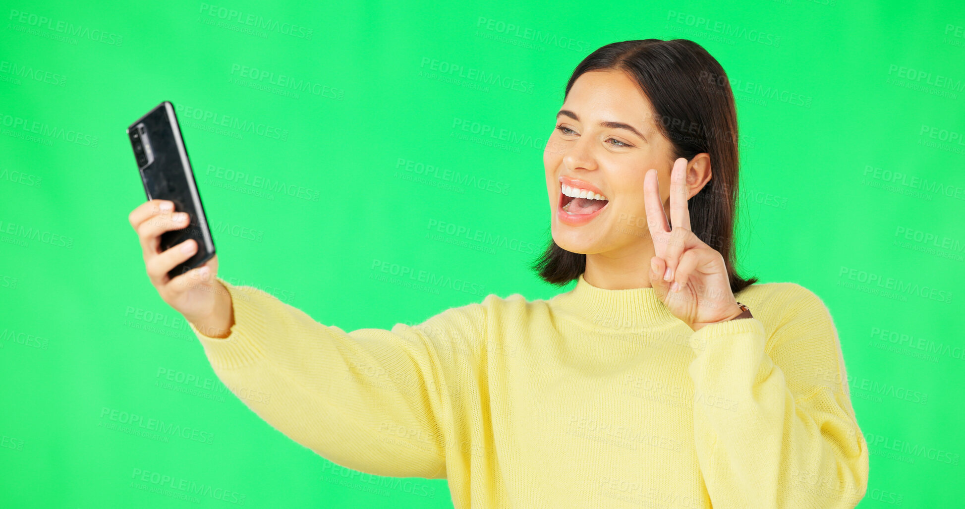 Buy stock photo Green screen, peace sign or happy woman taking selfie on social media with confidence or smile. Gen z girl, cool or influencer taking a photograph, vlog or picture isolated on a studio background