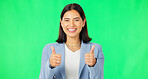 Happy woman, hands and thumbs up on green screen for success, winning or agreement against a studio background. Portrait of business female showing thumb emoji, yes sign or like on chromakey mockup