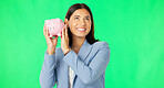 Business woman, money and savings on green screen for investment, budget or finance against studio background. Portrait of happy female smile holding piggybank for coin, profit or investing on mockup