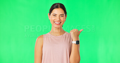 Buy stock photo Green screen, presentation or portrait of happy woman in studio for mockup space, gym promo or advice. Fitness coach, sales deal or personal trainer pointing to health ads option or marketing offer