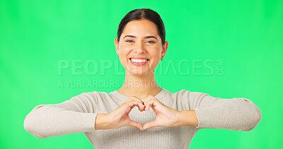 Buy stock photo Portrait, heart hands and woman with green screen, smile and support with review on studio background. Face, happy person or model with promotion, symbol for love or feedback with icon, emoji or like