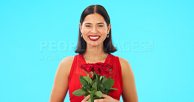 Buy stock photo Woman, romance and alone with roses in studio on blue background for mock up, portrait and romance. Person, happy and smiling with excitement for marketing of valentines day, love and celebration 