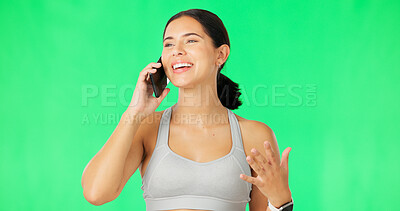 Buy stock photo Phone call, smile and woman talking on a green screen background in studio for listening to communication. Mobile, happy coach and personal trainer in conversation for fitness, sport and mockup space