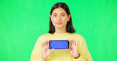 Buy stock photo Green screen mobile, phone and portrait of woman presentation of logo design, web promo or brand. Cellphone tracking markers, mockup space or person show social media application on studio background